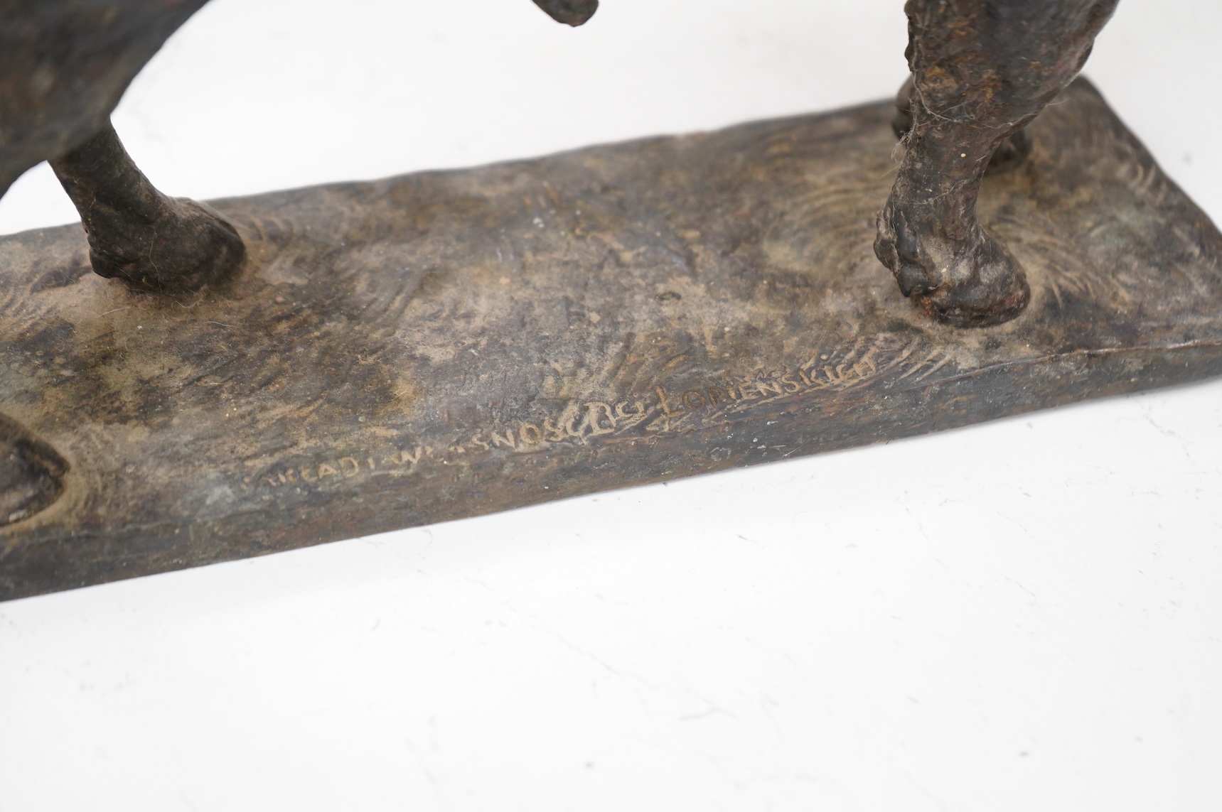 After the Lopienski Brothers, a Polish bronze study of a buffalo, signed, 30cm wide